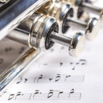 trumpet-on-sheet-music